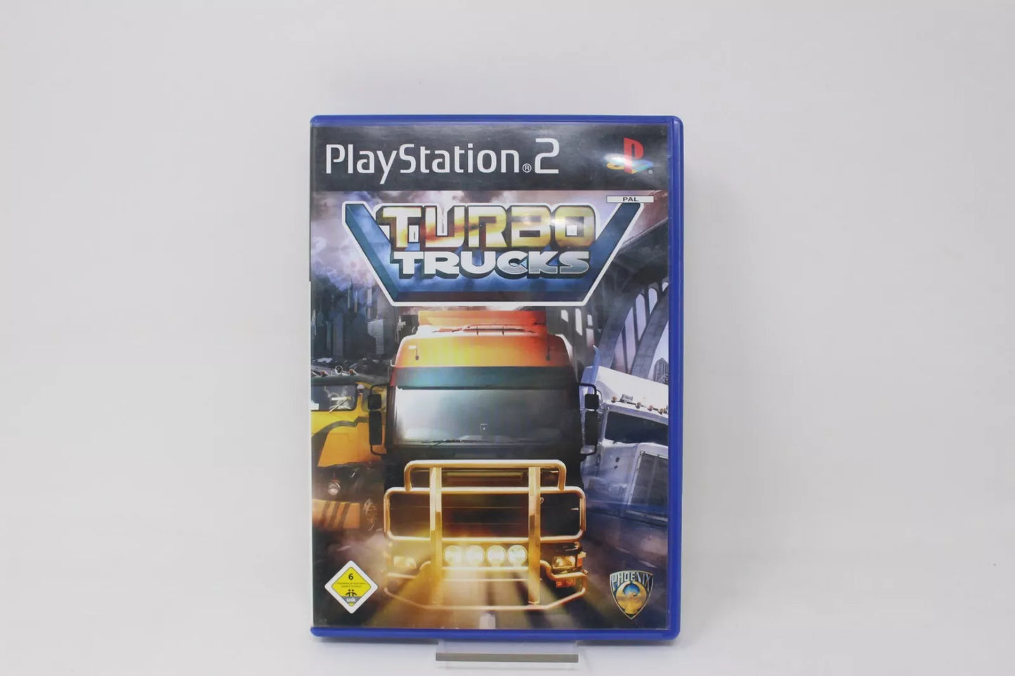 SÓLO CAJA + MANUAL TURBO TRUCKS - SONY PS2 PLAY STATION INV-10293